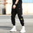 Streetwear Black Harem Pants Men Elastic Waist Punk Pants With Ribbons Casual Slim Jogger Pants Men Hip Hop Trousers