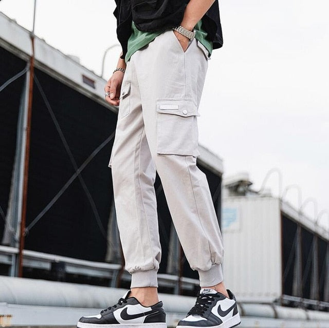 2020 Hip Hop Boy Multi-pocket Elastic Waist Design Harem cargo Pant Men Streetwear Punk Cargo Trousers Jogger Male Dancing Black Pant